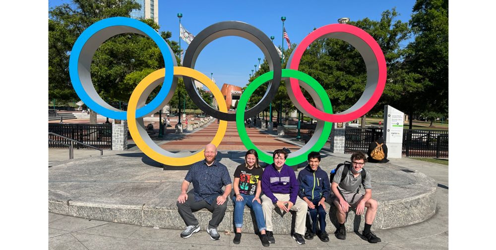   The Ridgefield High School Knowledge Bowl team traveled to Atlanta for their first in person national competition thanks to the generosity of Ridgefield residents (L to R: Coach David Jacobson and team members Emi Newell, Adam Ford, James Haddix, and Stuart Swingruber)