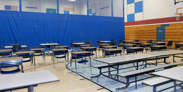 A blue curtain separates the gym and cafeteria at Union Ridge