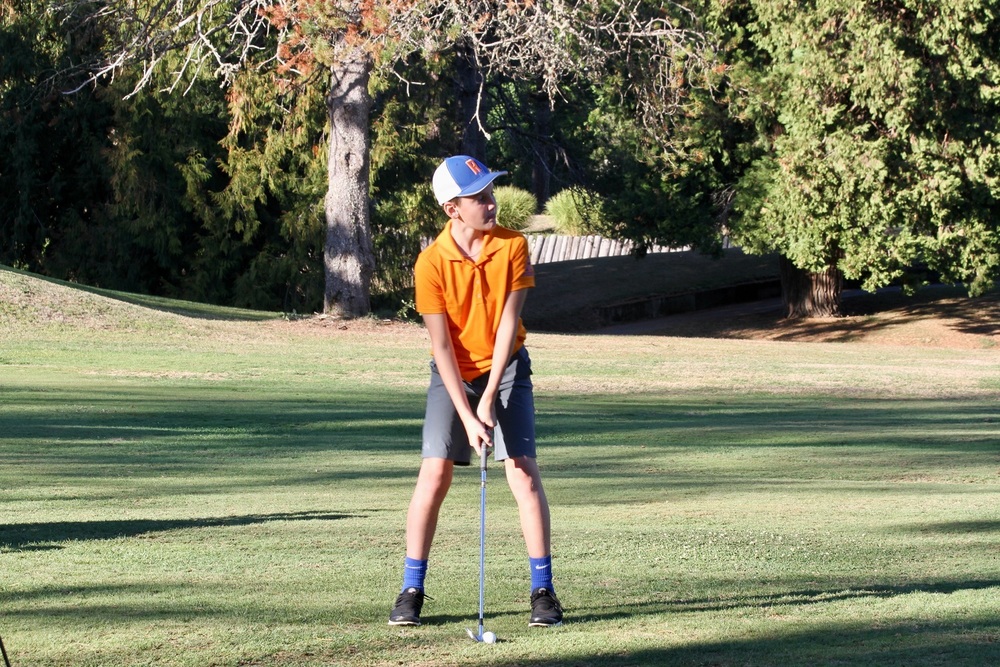 View Ridge Golf team member Brody Newcombe concentrates as he prepares his shot