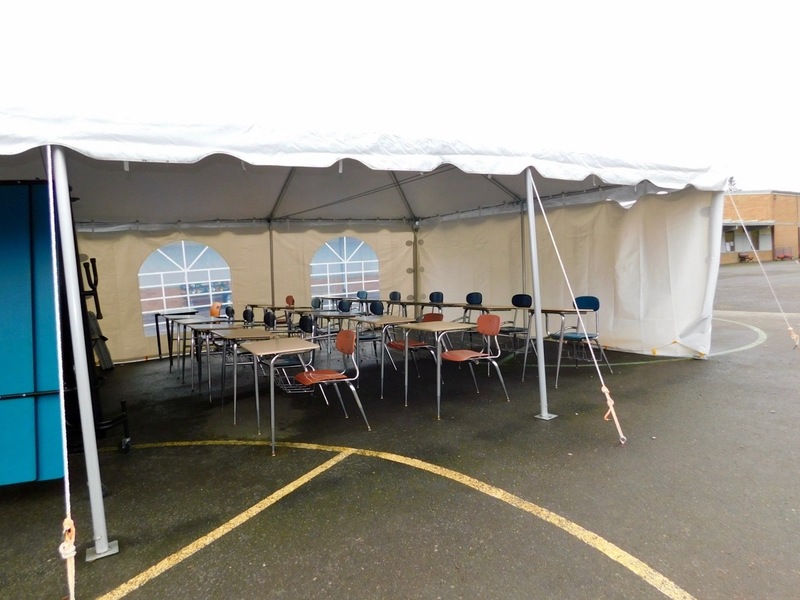 The cafeteria in the newer building still isn’t large enough to accommodate so many students with COVID seating restrictions, so there is additional lunchtime seating under a tent in the recess area