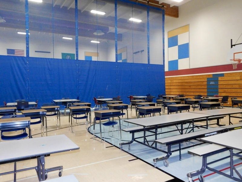 The gym/cafeteria used to be used for one or the other—but now it has to be both at the same time