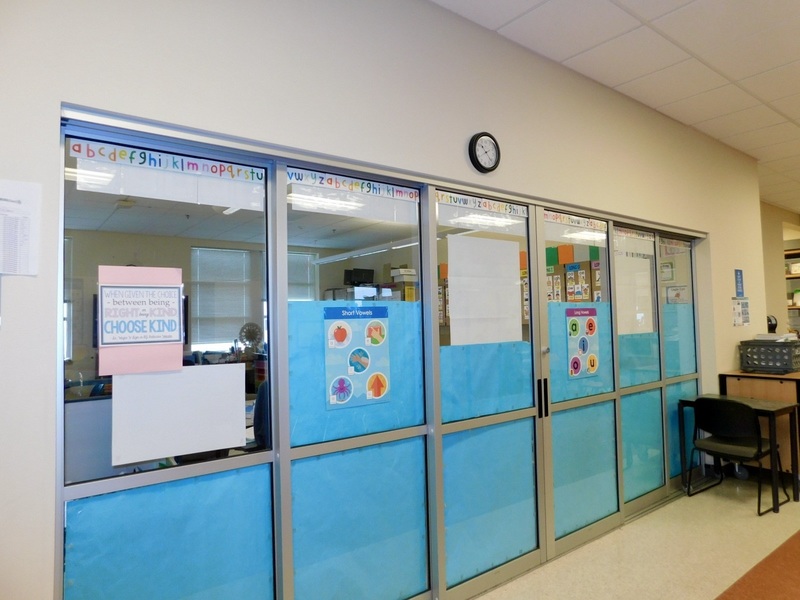 The former science lab, a point of pride for Union Ridge’s newer building, has been pulled into use as a classroom.  The glass wall is papered over to block out the constant activity in the common area.